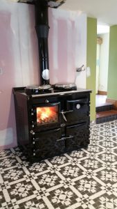 AGA black wood fired range.